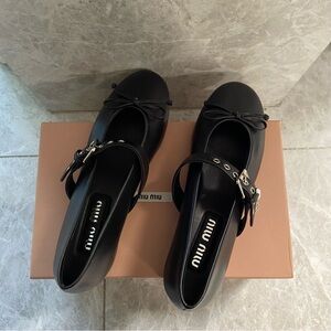 Miniu Screen Printed Logo Bow
Leather Ballerinas